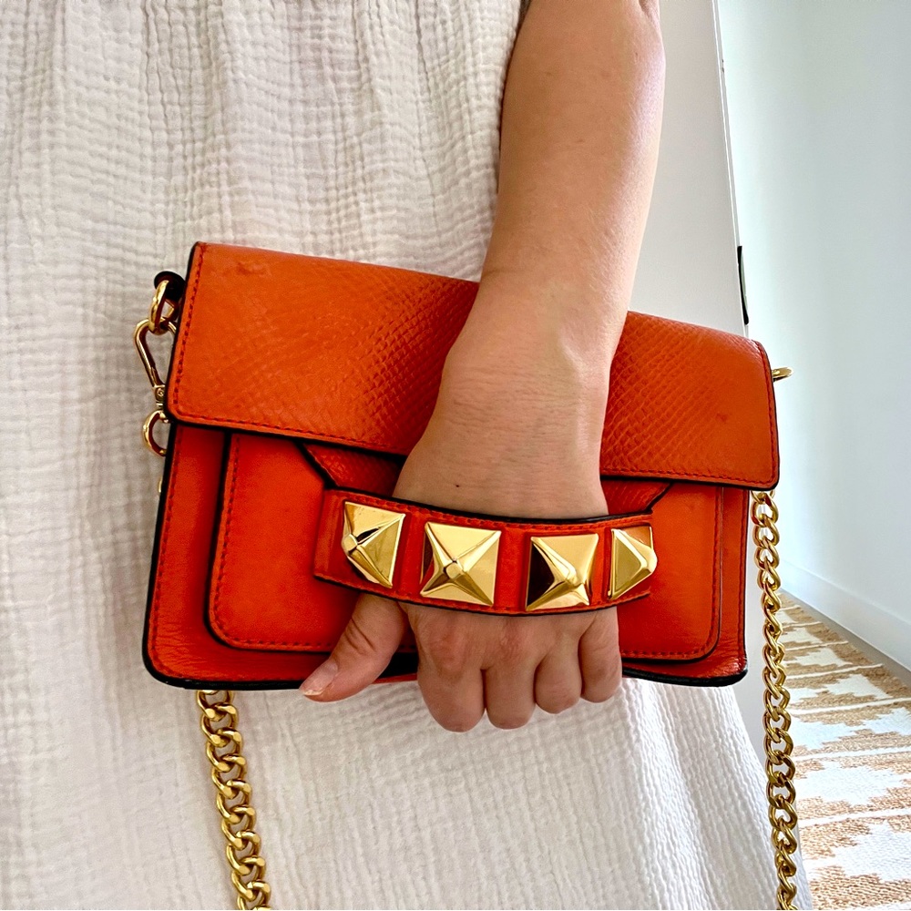 Linea Pelle Grayson Leather Orange crossbody bag and clutch